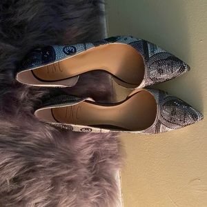 Heels for women with dollar print.